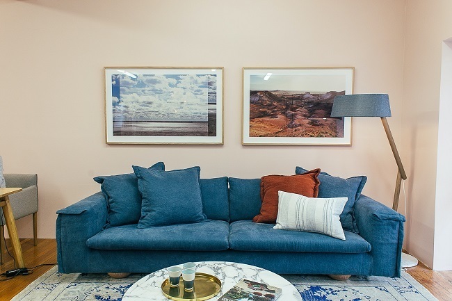 living room decor with blue sofa